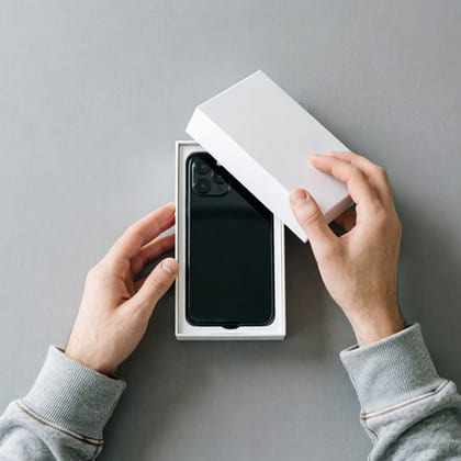 Reese, Phone unboxing flat lay