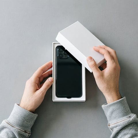 Phone unboxing flat lay