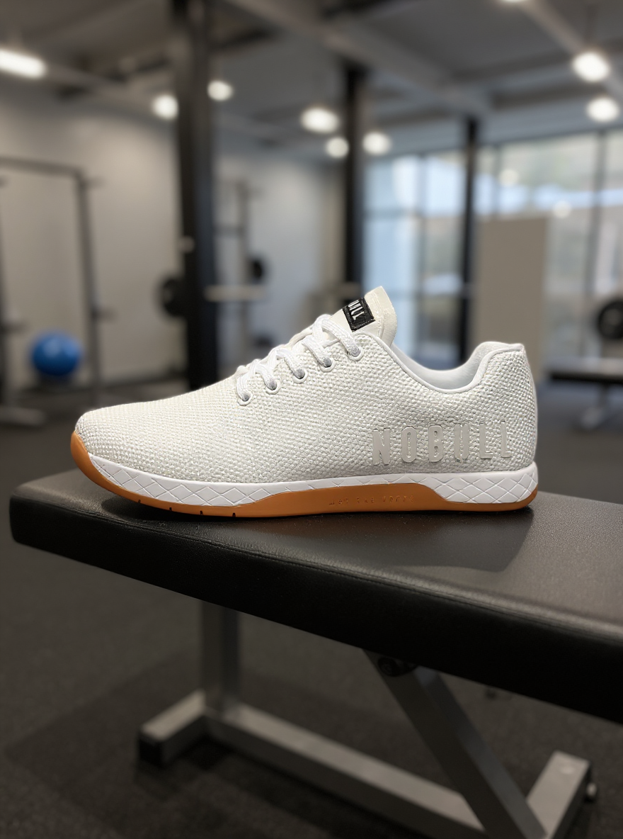 showcase the shoe on a workout bench in a modern gym setting
