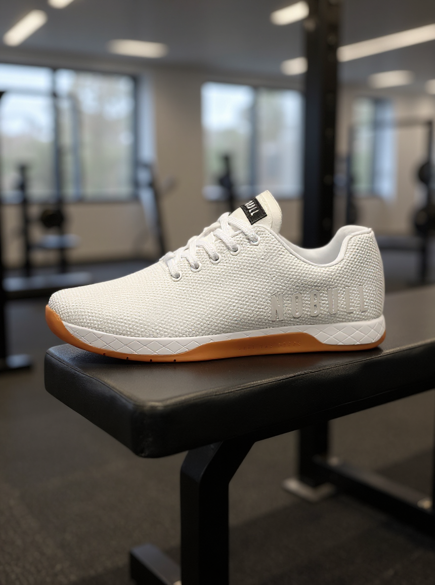 showcase the shoe on a workout bench in a modern gym setting